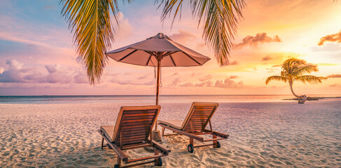 Amazing beach. Romantic chairs umbrella on sandy beach palm tree leaves, sun sea sky. Summer holiday, couples vacation. Love happy tropical landscape. Tranquil island coast relax beautiful landscape