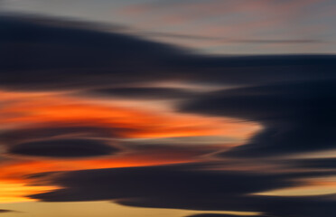 Vibrant Long Exposure of Dusk Sky with Multicolored Clouds