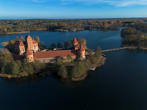 Drone picture of Trakai castle from the side surrounded by lake Galve (Galvė) located in Trakai, Lithuania