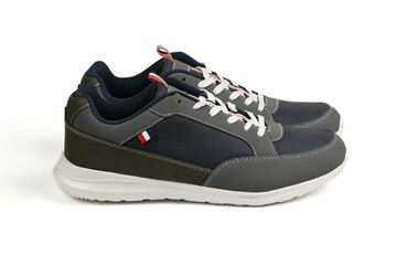 Pair of black fashionable stylish sports casual shoes isolated on white background