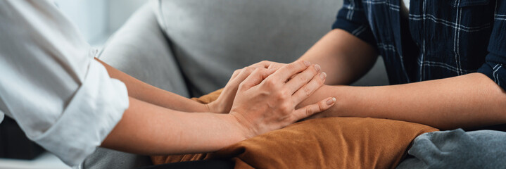 Close up shot of supportive and comforting hands for cheering up depressed person or stressed mind...
