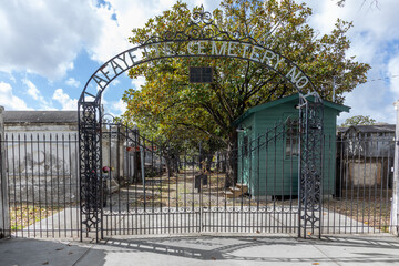 historic iron entrance gate of La Fayette cemetery in New Orleans, Louisiana