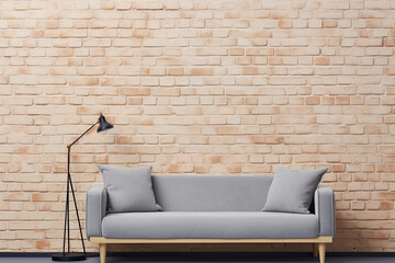 Mock-up brick wall and a grey sofa in the center.