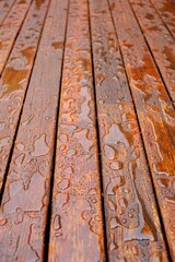 4K Image: Close-Up of Raindrops Over Newly Painted Deck