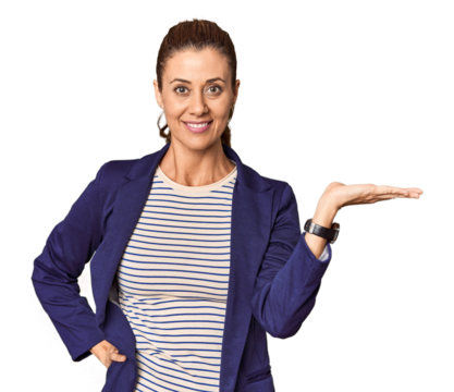 Middle-aged female entrepreneur in studio showing a copy space on a palm and holding another hand on waist.