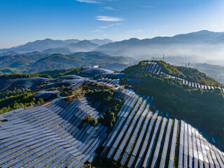 Aerial photography of solar photovoltaic panels on mountain top