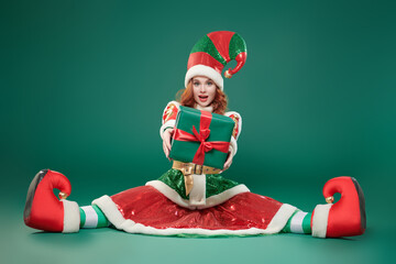 elf girl with gift - obrazy, fototapety, plakaty