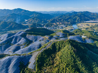 Aerial photography of solar photovoltaic panels on mountain top