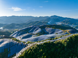 Aerial photography of solar photovoltaic panels on mountain top