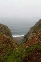 Passing cape on Popov Island in Peter the Great Bay of the Sea of Japan