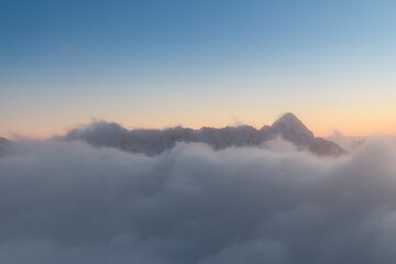 A sea of ​​clouds admired from the top of Kozi Wierch during an amazing sunset