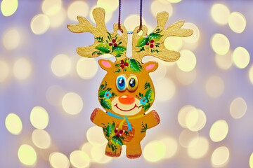 Ukrainian Christmas ornament. Funny reindeer figurine decor.