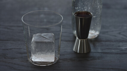 Making non alcohol spritz drink in a tumbler glass