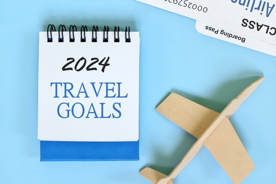 Year 2024 travel goals. Beautiful creative flat lay composition. - Powered by Adobe