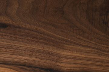 Black walnut wood texture with oil finish closeup