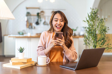 Woman use smartphone playing, shopping, social media communication and digital online, work, online social media, online marketing, technology, chat, post, like, follow on phone screen at home