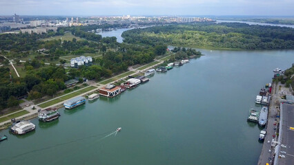 Daytime aerial shot in Belgrade, Serbia. Sava River and general city view