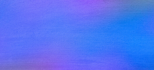 Blue violet lilac toned texture of plastered wall. Grainy background for website banner. Desktop design. A large, wide template, pattern. Color gradient. Colorful, mix, bright. Original texture