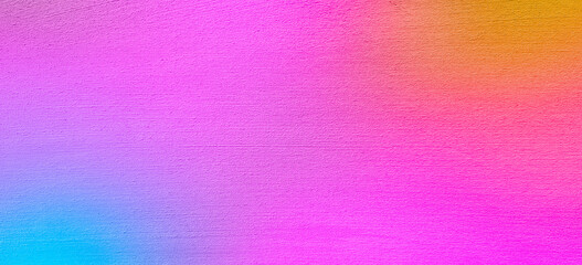 Pink blue yellow tinted texture of plastered wall. Grainy background for website banner. Desktop design. A large, wide template, pattern. Color gradient. Colorful, mix, bright. Original texture