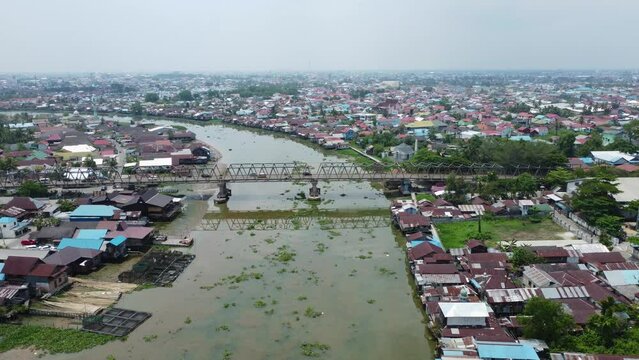 Aerial view of the bridge known as the Banua Anyar Bridge in Banjarmasin which is over the very large Martapura River