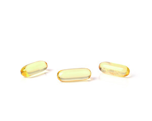 Primrose oil capsules isolated on white background.