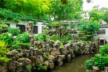 the beautiful view of Yu Garden. It is an extensive Chinese garden located beside the City God...