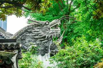 the dragon sharp roof of Yu Garden. It is an extensive Chinese garden located beside the City God...