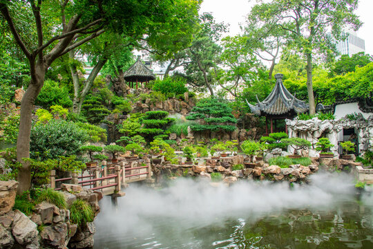 Shanghai China 11th Jun 2023: the pavillion and pond in Yu Garden. It is an extensive Chinese garden located beside the City God Temple in the northeast of the Old City of Shanghai. 