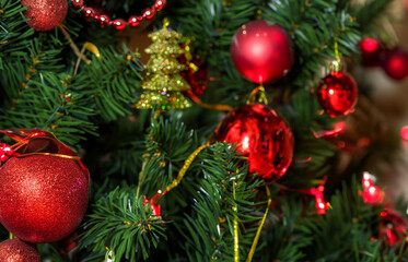 red and golden christmas tree decorations