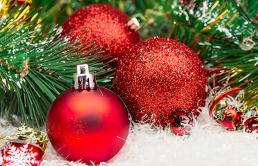 Naklejka na ściany i meble red christmas ball on a tree