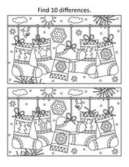 Difference game or picture puzzle with socks hanging on string
