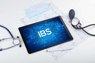 Close-up view of a tablet pc with medical abbreviation