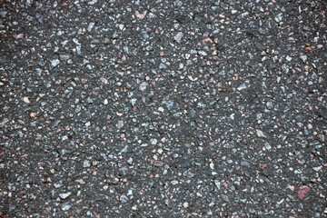 Surface grunge rough of asphalt. Tarmac dark grey grainy road. Texture Background Top view close up