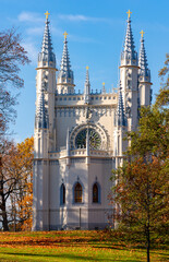 Gothic chapel in Alexandria park in autumn, Peterhof, Saint Petersburg, Russia - obrazy, fototapety, plakaty