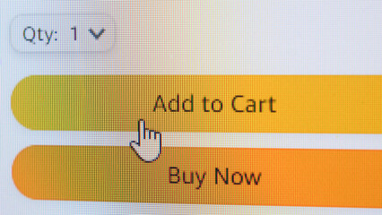 Close-up of a user engaging in e-commerce by clicking the 