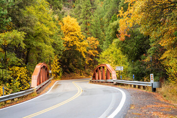 California State Route 32 Bridge at Deer Creek in Tehama County California USA on an autumn day.