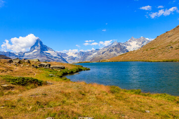 View of Stelli Lake (Stellisee) and Matterhorn mountain at summer in Zermatt, Swiss Alps,...