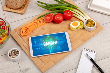 Tablet Pc with fruits, medical concept