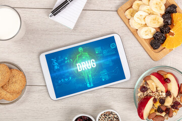 Tablet Pc with fruits, medical concept