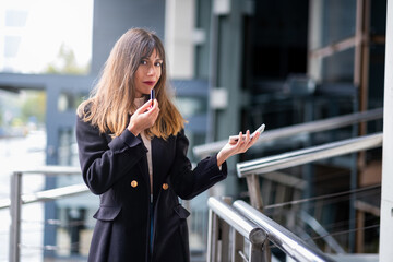 Fototapeta premium Urban allure, lipstick strokes, Madrid's charm.