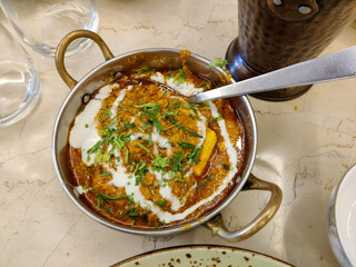Photo of a serving of dal tadka fry, a classic Indian dish, captured with a close-up.