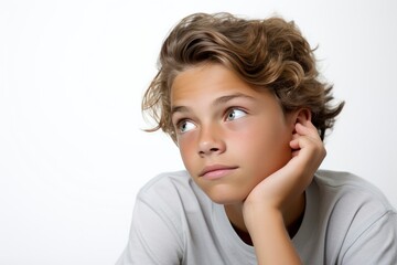 Fototapeta premium A Determined Young Boy With a Serious Expression on His Face