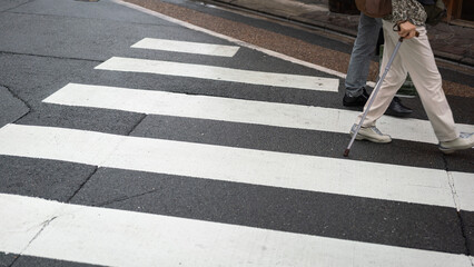 Zebra crossing line on the asphalt road, area for pedestrian crossing road safely. Transportation...