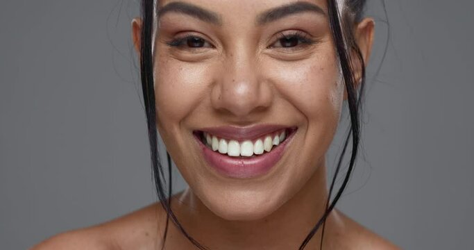 Face, skincare and beauty of happy woman in studio isolated on a gray background. Portrait, natural and smile of model in spa facial treatment for aesthetic, glow and cosmetic wellness for health