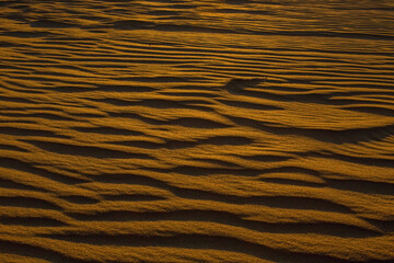 Sand waves background texture in Egypt