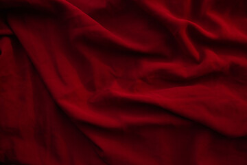 Red fabric drapery texture. Soft textile close up