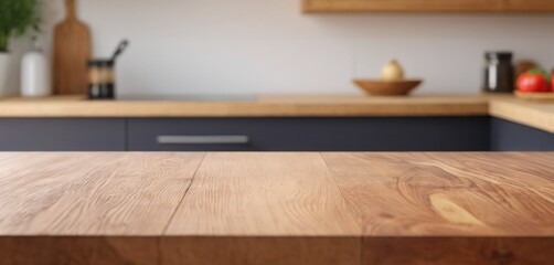 Wooden table on blurred kitchen bench background. Empty wooden table and blurred kitchen background for display or montage your products