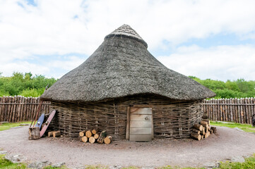 A replica iron-age dwelling, made from willow, hazel and thatch