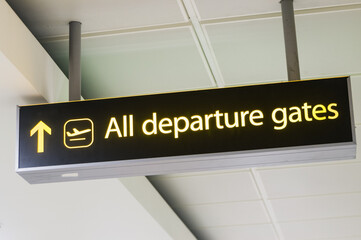Sign directing passengers to all departure gates at an airport.