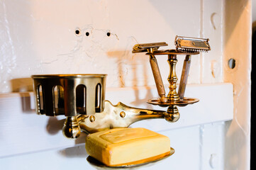 Old-fashioned gentleman's brass shaving and wash stand from the early 1900s.